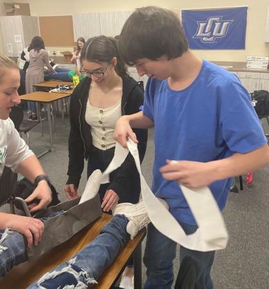 HANDS ON FCISD's Intro to Health Science classes have been learning how to treat/stabilize injuries. This is the first course in the Healthcare Therapeutic Pathway offered as part of FCISD's P-TECH school. | COURTESY PHOTOS