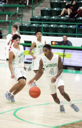 STRONG START The Floydada Whirlwinds varsity basketball team (above right) went into Thanksgiving with much to be thankful for. They entered the holiday break with a 4-0 season record, defeating Idalou 70-46. They had the rest of the holiday week off and resumed play Tuesday, Nov. 29 against Lubbock Roosevelt. | SAUL CASTILLO PHOTO