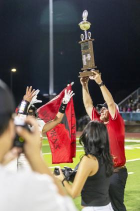 HOW SWEET IT IS Lockney head coach Jonathan Thiebaud relishes the Longhorns’ victory in Friday night’s Floyd County matchup in Floydada, taking home the trophy for the first time since 2021. MORE PHOTOS, PAGE 5