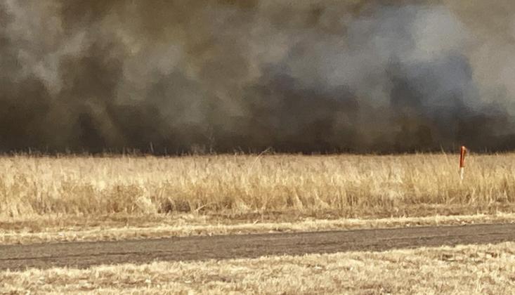 A FAST-MOVING GRASS FIRE burned more than 600 acres of dry land between Lockney and Floydada Sunday afternoon, with DPS closing U.S. Highway 70 to traffic for a while. | FRED CERVANTES PHOTOS