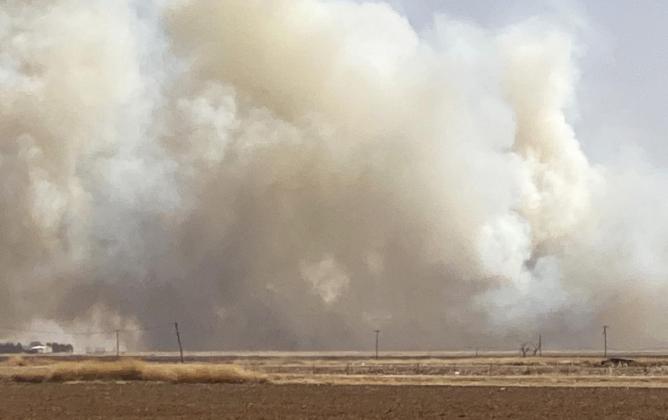 NO RESIDENCES WERE DESTROYED in Sunday’s fire, thanks to diligent efforts of numerous local volunteer fire departments. | FRED CERVANTES PHOTOS