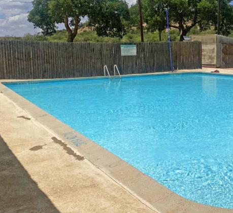 SLIDE ON IN! The Floydada Country Club has repaired its pool, which is open again Tuesdays through Saturdays to the general public as well as to club members. | H ESPERIAN-BEACON