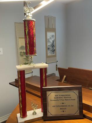 LOCKNEY BAND HONORS The Lockney Longhorn Band brought home two more awards this season. 1st Place in 2A, and Outstanding Small School Brass (1A-3A) from the historic Tumbleweed Marching Band Festival in Denver City. The Longhorn Band scored higher than all 1A, 2A, 3A, and a couple of 4A schools and ended up in the top exhibition slot that evening -- which ended up being a much stronger performance. Next is the Lubbock Westerner Festival on October 11, 2025. | COURTESY PHOTOS