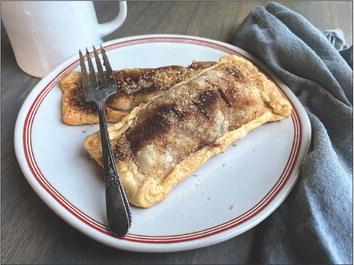 BAKED, NOT DEEP-FRIED A flaky crust filled with crisp apples and chewy dates is a winning combination for a hand pie, topped with cinnamon and crunchy turbinado sugar. | ANGELINA LARUE photo