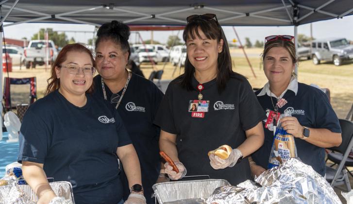 HOSPITAL HELPERS HOST IN HEAT Staffers from Lockney’s WJ Mangold Memorial Hospital and West Texas National Bank assisted with serving a hamburger supper during the city’s July 23 KCBD Channel 11 Community Coverage event. The school district and local businesses were featured at the gathering in the city park—where proximity of the city swimming pool was a popular antidote to triple-digit temps. SPOTLIGHT PHOTOS, PAGE 8 | CERVANTES PHOTOGRAPHY