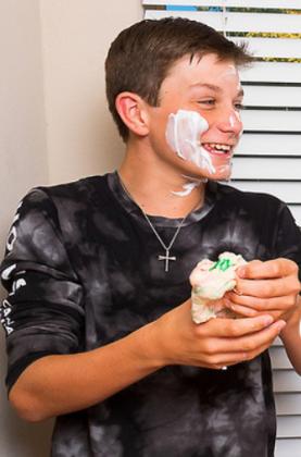 SLIME TESTERS Brennan Vinson, Landry Stephens, and Gavin Vinson, found that the one made with laundry soap proved to be a favorite. | ANGELINA LaRUE PHOTO