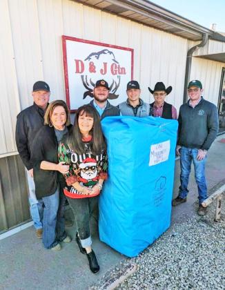 MILLIONTH BALE D&amp;amp;J Gin, Inc. of Lockney ginned their one millionth bale of cotton December 5; the cotton was grown by Mark and Kelley McCormick of Floydada. From left are Jody Foster, Shawnda Foster, Lesca Durham, Blake Lorenz (Allenberg Cotton), Chase Young, David Foster and Will Foster. | COURTESY PHOTO