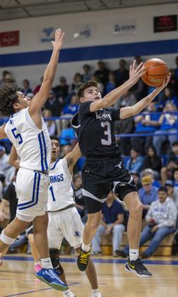LOGAN RODRIGUEZ makes the play in a matchup versus Olton Jan. 30.