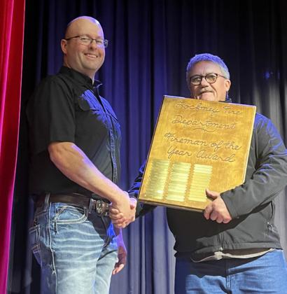 FIREMAN OF THE YEAR Donnie McLaughlin (right) presented Justin Graves the Fireman of the Year 2023 award at the Lockney Chamber Banquet. | LOCKNEY CHAMBER PHOTO