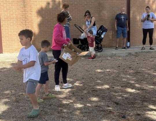 STORYTIME INTHE PLAYGROUND Last week Lockney Elementary youngsters enjoyed story time in the playground with reading adventures with “The Wonky Donkey” and “Pete the Cat” before the school opened the playground for summer fun. | COURTESY PHOTOS