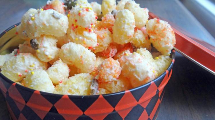 MAKE SOME TO KEEP AND SHARE This easy, celebratory snack is delicious at home, or for handing out to trick-or-treaters. | ANGELINA LARUE PHOTO