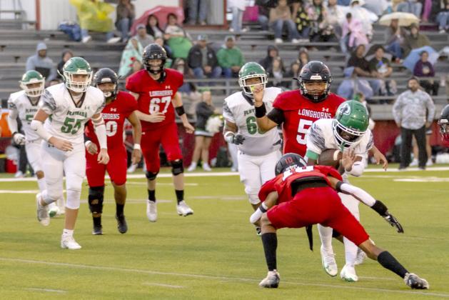 Longhorns keep county championship trophy