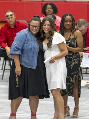 Coach Salazar and Mattee Rehkopf at athletic banquet