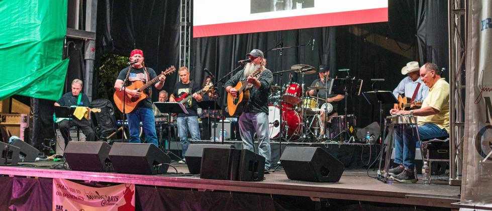 OPENING ACT Area favorite Steve Burrus and group performs in first event concert. | COURTESY PHOTO