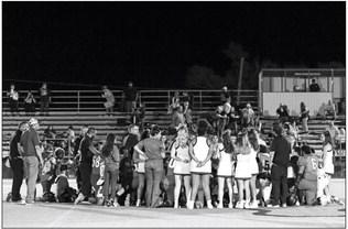 PRAYERS FROM BOTH SIDES The score stood at 28–21 in favor of the Plains Cowboys when Plains’ #9 suffered a concussion and play was suspended. Plains ISD’s Facebook page the following day explained,“Everything is good. Concussion only and releasing him tonight and he is going home.” MORE PHOTOS, PAGE 12 | CERVANTES PHOTOGRAPHY