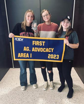 From left, Kirsten Pyle, Mia Snowden and Syndi Chesshir (Miranda Reyes on phone) will be competing at the State competition on Dec. 1-2. | FCISD PHOTO