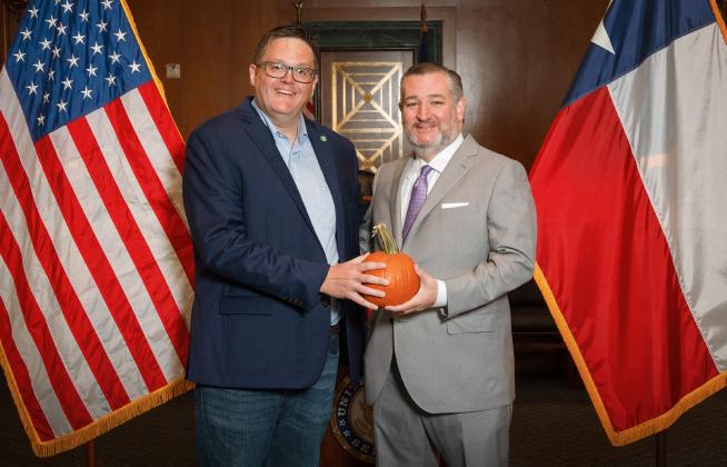 CROWING ABOUT FLOYDADA IN DC, left, was Floydada EDC director Ryan Crowe, who took a local pumpkin with him as a presentation to Texas Sen. Ted Cruz. | COURTESY