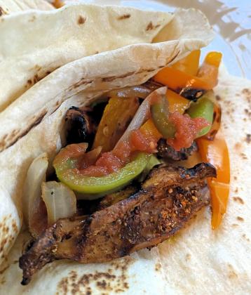’SHROOMS WITH A SIZZLE For a meaty-textured alternative in your favorite Mexican wrap, try Royal Trumpet mushrooms— though any variety will work in this healthy recipe. | ANGELINA LaRUE PHOTO