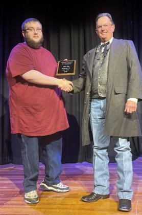 BUSINESS OF THE YEAR Stevie Carlin (left), manager of Maroon Saloon, presented Business of the Year 2023 to David Foster, former owner of D &amp;amp; J Gin at the Lockney Chamber Banquet. | LOCKNEY CHAMBER PHOTO