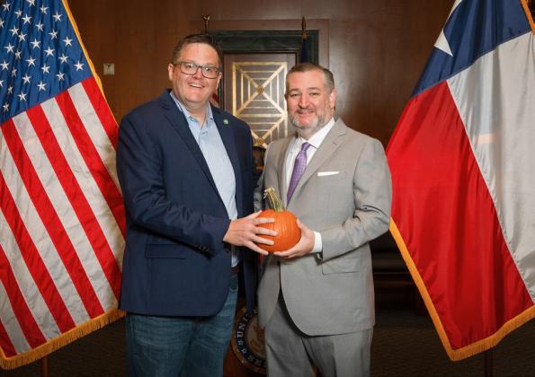 CROWING ABOUT FLOYDADA IN DC, left, was Floydada EDC director Ryan Crowe, who took a local pumpkin with him as a presentation to Texas Sen. Ted Cruz. | COURTESY PHOTO