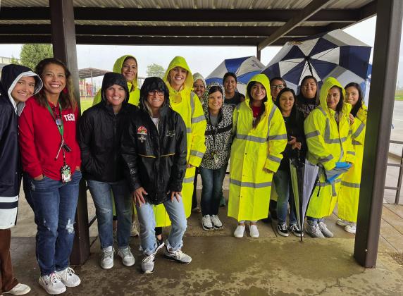 RAIN OR SHINE Come rain or shine, the Duncan Elementary staff in Floydada makes sure that all children get home safely. | COURTESY PHOTO