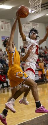 SHINING MOMENTS during a pair of tough district losses on their home court Jan. 20 included key plays by Coach Brewer’s Bo Alvis and Dahlen Silva (above), and for the girls by Tylee Benton, Aubrey Rodriguez and CarlyWright (below). | CERVANTES PHOTOGRAPHY