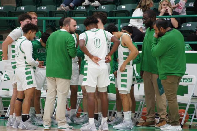 BASKETBALL UNDERWAY Floydada boys and girls basketball took a pair of victories this week from Lubbock Cooper Liberty. The Whirlwinds won 73-66 and the Lady Winds won 46-38. | FLOYDADA YEARBOOK STAFF PHOTOS