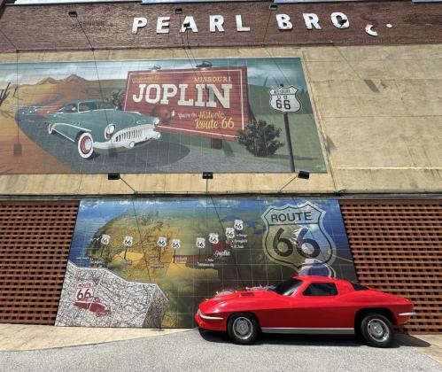 ROUTE 66 IN 3-D Yes, the convertible (only half of one, actually) is part of the art installation on Joplin’s Pearl Bros. building.