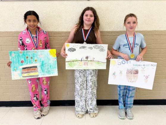 FOURTH GRADE winners were, from left, Kailynn Fernandez, 3rd place; Scarlet Campbell, 2nd place; and Colbie Sinkhorn, 1st place. | COURTESY PHOTO