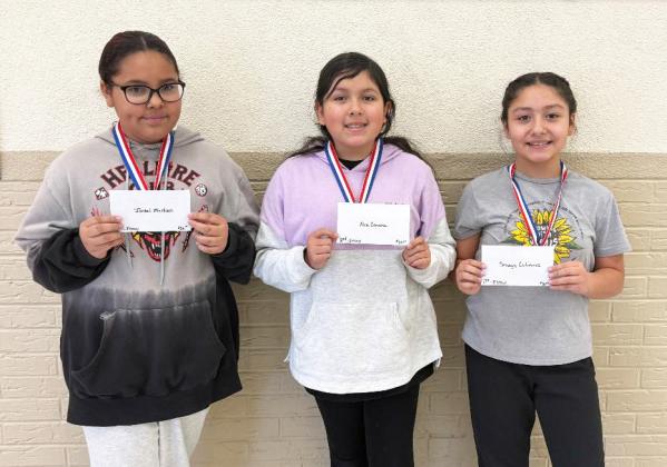 FIFTH GRADE winners in the essay contest were, from left, Isabel Martinez, 3rd place; Alexi Cervera, 2nd place; and Senaya Gutierrez, 1st place. | COURTESY PHOTO