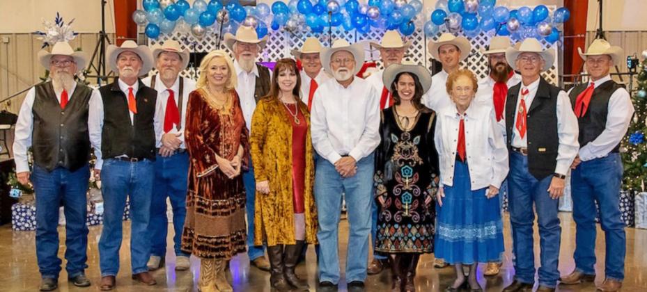 WENDELL SOLLIS AND THE SIDEKICKS ALL-STAR BAND (above) played for the Seventh Annual Country Christmas Ball on Saturday, Dec. 4. Band members are from left, Bob Baker, Ronnie Shultz, Kelly Hastey, Andrea Wilkinson, Steve Wilkinson, Cathy Jewell, Rodney Lay, Steve Ham, Mike Bennett, Ginny Mac, Brady Rasco, Lucy Dean Record, Chad Maines, Wendell Sollis and Greg Gibbs. | BIRDDOG PHOTOGRAPHY