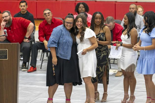 Coach Salazar and Mattee Rehkopf at athletic banquet