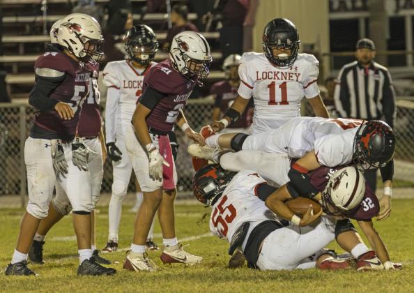 PILEUP Tye Graves and Carson Pritchard make the tackle. | CERVANTES PHOTOGRAPHY