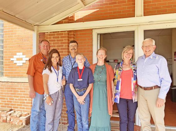 SINGING STUDENTS (Above left: Rana Hamilton helps with dinner on Oklahoma night at Harmony Plains. At left, Joey and Barbara Lowrance, James, Joseph, and Julie Taylor, Charlotte and Dickie Halbegwachs in front of the Harmony Plains Singing School in Cone, Texas. | LIZ ADAMS PHOTOS