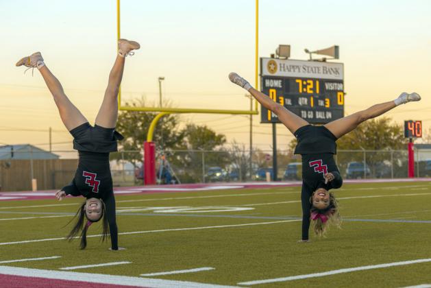HEAD OVER HEELS FOR LONGHORNS Fans enjoyed the energetic encouragement of the Lockney Cheer squad during last week's game against the Ralls Jackrabbits. | CERVANTES PHOTOGRAPHY