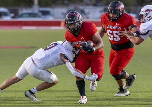 Longhorns roll over Rabbits, 21–2