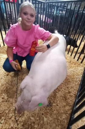 SECOND PLACE Congratulations go to Floydada FFA member Payten Shuping on placing second with her Chester gilt at the Panhandle South Plains Fair last weekend. Shuping is a junior at Floydada Collegiate High School. | FCISD PHOTO