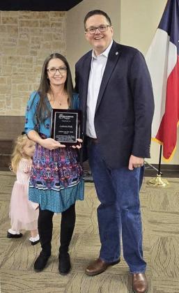 CITIZEN OFTHEYEAR Floydada nativeandcommunityvolunteer Ludustia Prisk (left) was named Floydada Citizen of the Year at the recent Floydada Chamber of Commerce and Agriculture’s annual banquet. The award was presented by Chamber member Ryan Crowe (right), and Prisk’s daughter, Emily Prisk, offered the comments below as a tribute to the honoree. | COURTESY PHOTO