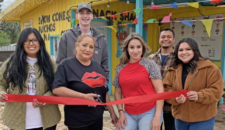 SNOW CONES AND MORE Floydada native Maricela Reyna, along with family and friends, recently cut the ribbon on her new enterprise, Snack Shack Snow Cones, which will open to the public on Wednesday. | COURTESY PHOTO