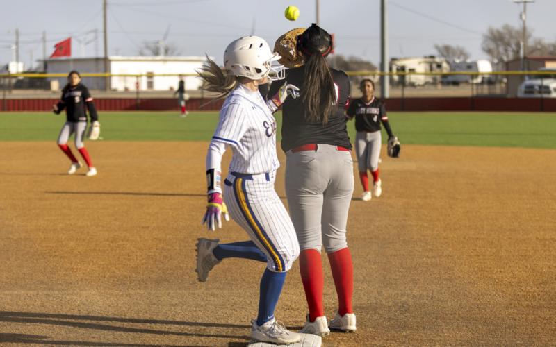 Jasmine Gonzales’ throw to Lily Jimenez just misses the out