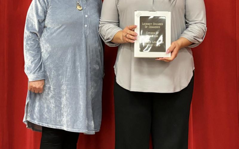 CITIZENS OF THE YEAR Chamber member Jan Ragland (left) presented the Lockney Chamber’s Citizens of the Year award for 2025 to Stephanie Esquivel, representing the Longhorn Parent Club.