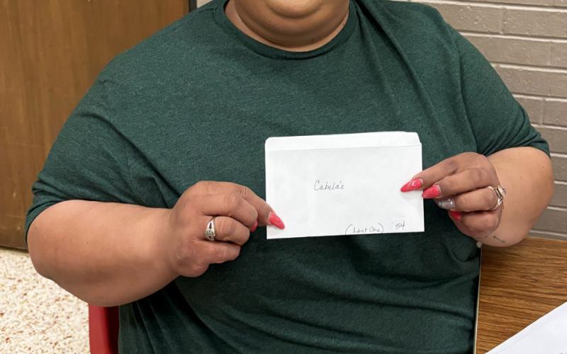 VILMA RUBIO won the top door prize, a $250 Cabela’s gift card.
