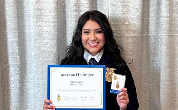 KAITLYN VEGA, Floydada FFA member, is awarded the National American FFA degree on Saturday, November 4, 2023 at the 96th National FFA Convention. | NIKKI SMITH PHOTOS