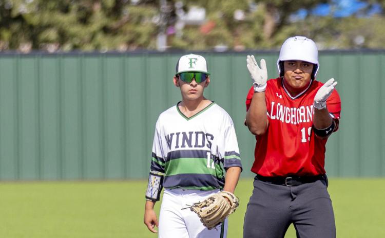 DOUBLE RBI for the Longhorns’ Xavier Jimenez (right) helped seal a 4–3 Lockney win against crosstown rivals Floydada Apr. 22. SPOTLIGHT PHOTOS, PAGE 8 | CERVANTESPHOTOGRAPHY