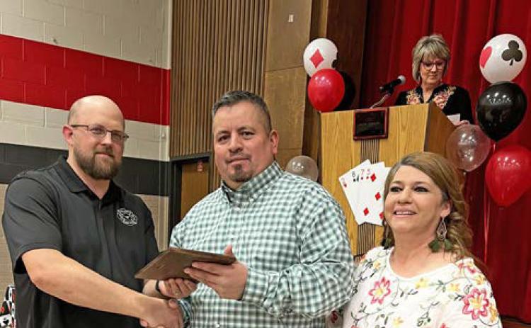 BUSINESS OFTHEYEAR The Old Maroon Saloon (Danny Huggins, owner) was selected as Business of the Year 2022. The plaque was presented by Jose and Melissa Martinez, representing the 2021 Business of the Year. | COURTESY PHOTO