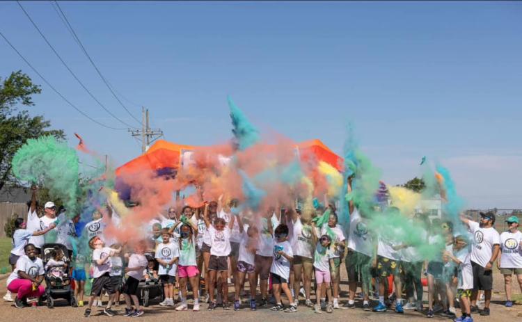 HEALTHY HUES Lockney’s Color Run and W.J. Mangold Memorial Hospital Health Fair demonstrated the hospital’s commitment to health and community spirit—as evidenced in the smiles and shared moments among participants. | RHONDA STOVALL PHOTO