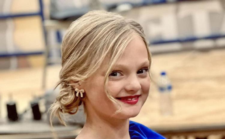 HOMETOWN TALENT At only 8, Laiken Brock, daughter of Taylor and Marissa Brock of Silverton, hopes to be selected to sing the national anthem at this year’s National Finals Rodeo in Las Vegas. | KODIE FAIRCHILD