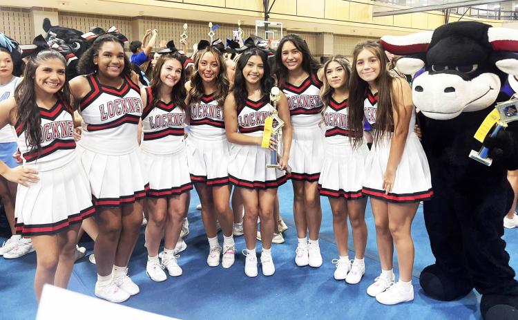 TOP HONORS The Lockney cheerleaders went to camp last week and came home with a 1st-place trophy for their Spirit Routine.Their Mascot came home with a trophy of her own. | COURTESY PHOTO