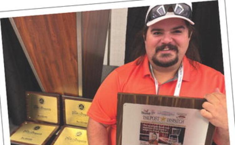 SWEEPSTAKES WINNER in Division 10, the state’s smallestcirculation weekly newspapers, was The Post Dispatch, a first for the Garza County newspaper. Claiming the honors for the Dispatch was sports journalist Russ Morris ( above, at the awards luncheon in Dallas June 20). Sweepstakes is awarded to the competing newspaper with the highest score of points won that year in all coverage categories.