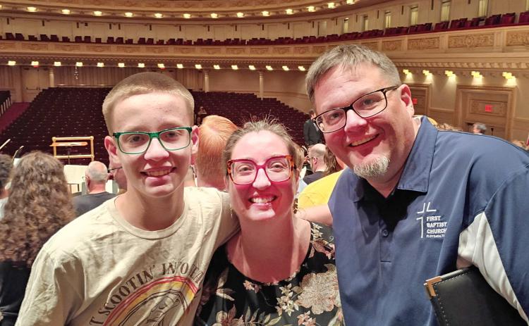 FAMILY AFFAIR 14-year-old Wesley Crowe, a rising sophomore at Floydada High School, joined his parents, Dr. Rebekah Crowe (center) and Ryan Crowe, in a choir performance at Carnegie Hall in New York City earlier this month. | COURTESY PHOTO